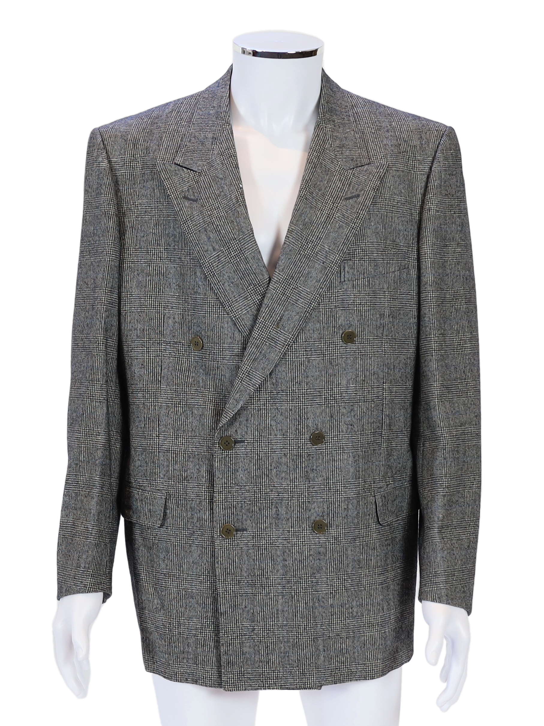 A Yves Saint Laurent rive gauche gentlemen's Prince of Wales check double breasted wool suit, approx size 42